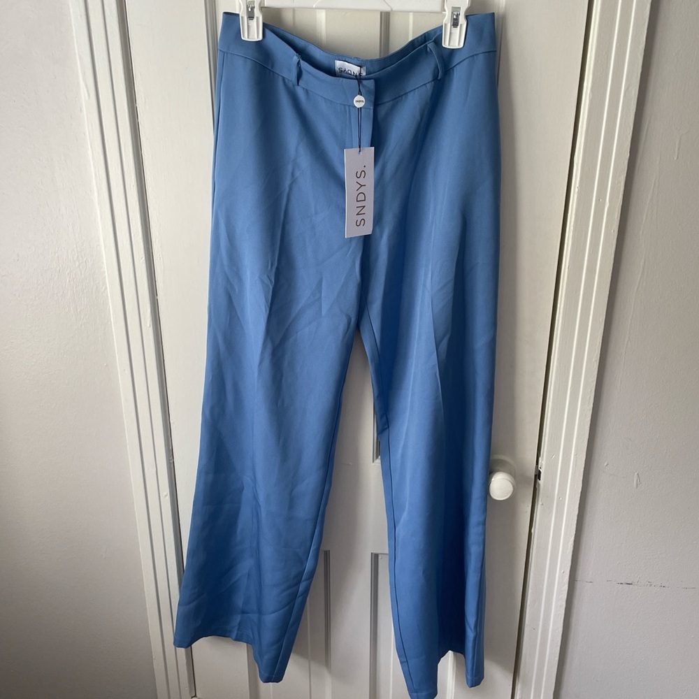 Never worn with tags. Blue work pants. Very comfortable